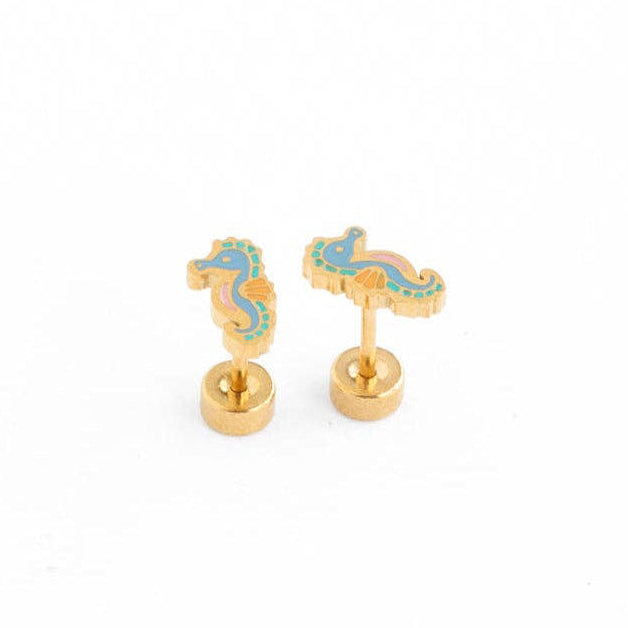 Gold and blue seahorse-shaped earrings on a white background