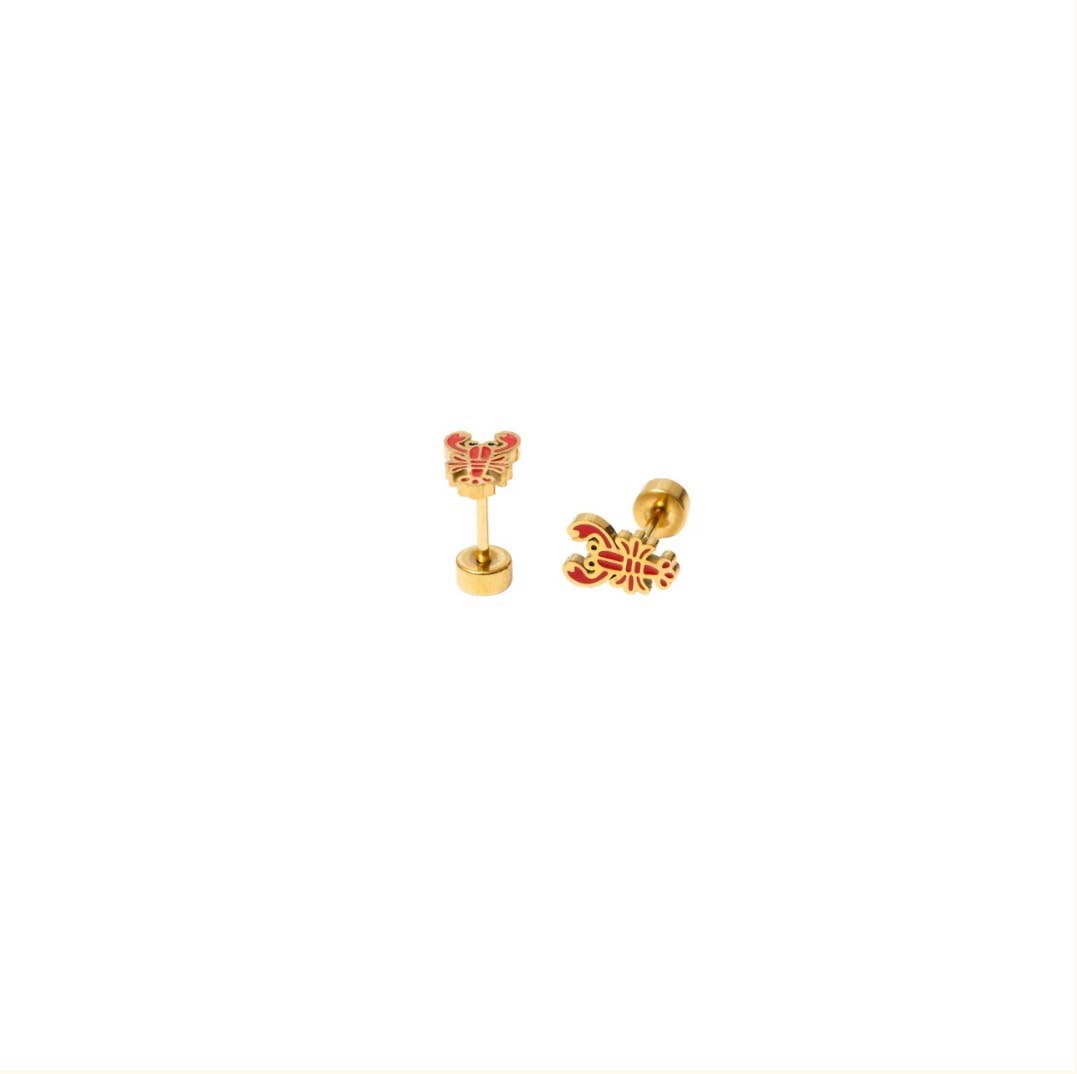 Silver heart-shaped earring with clear gemstones on a white background