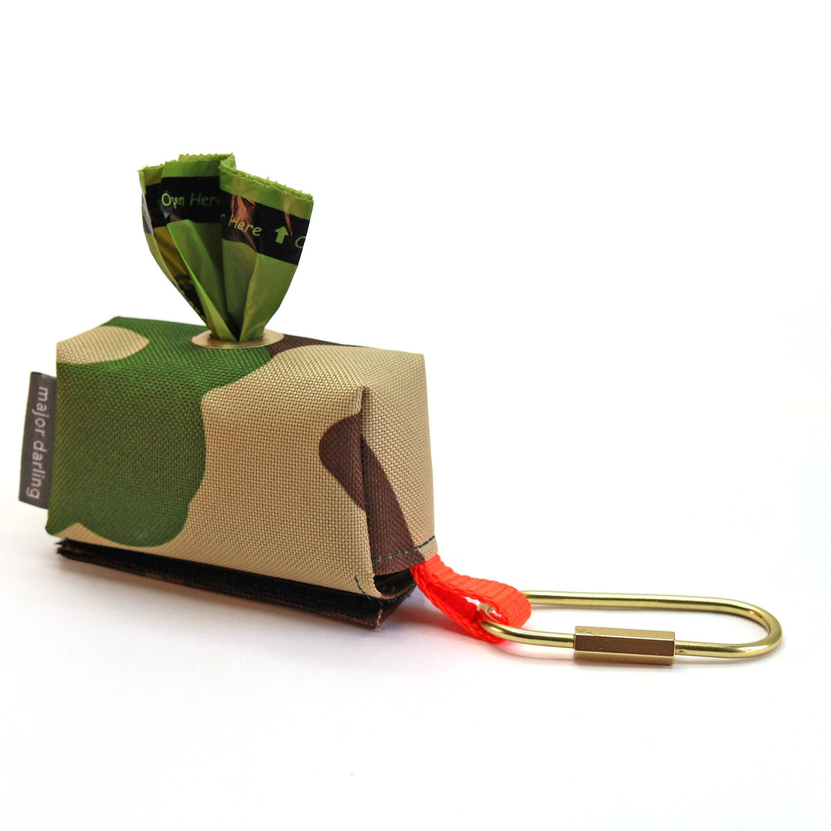 Close-up of a camo poop bag holder on a white background