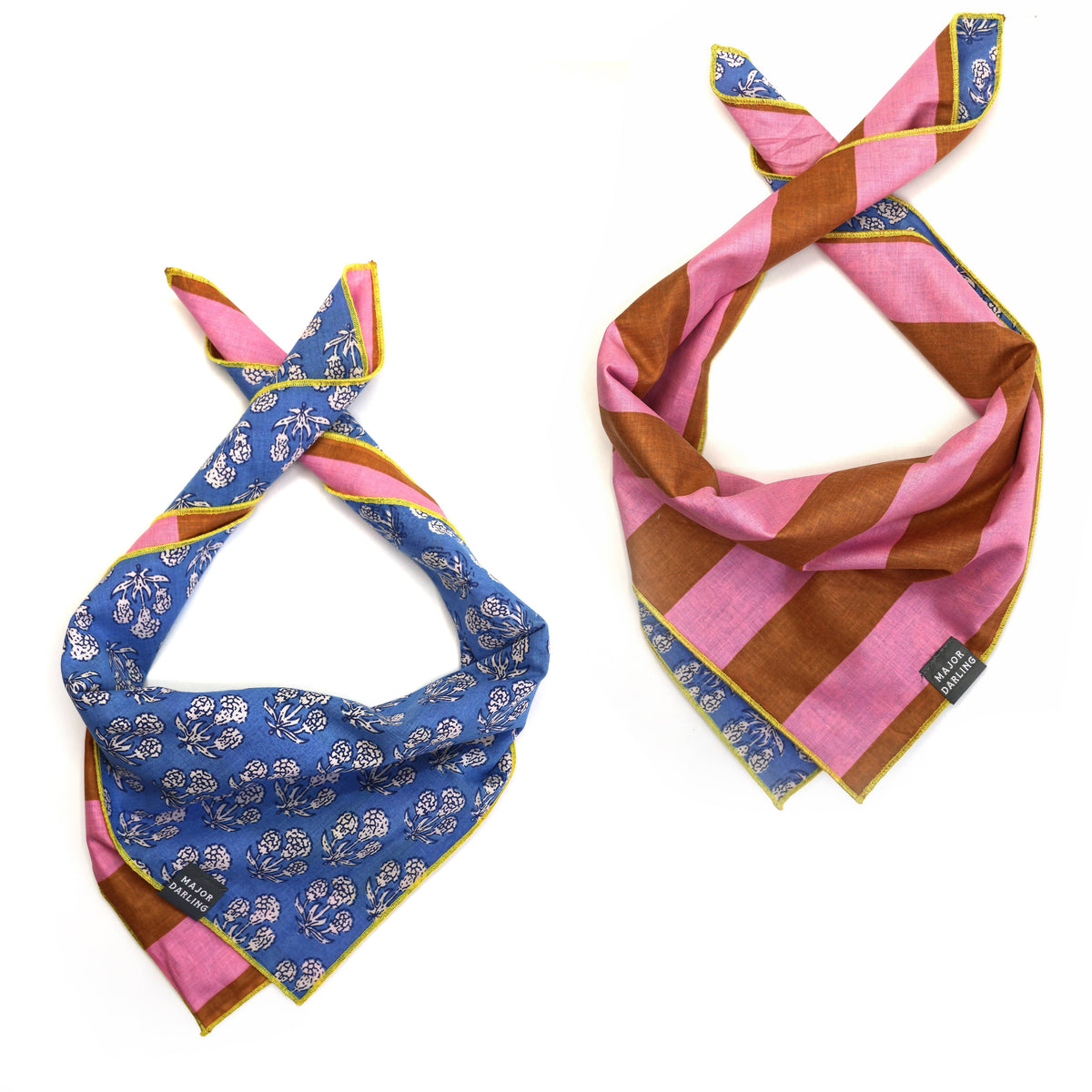 Double sided bandana with blue cornflower and pink and brown striped pattern on a white background