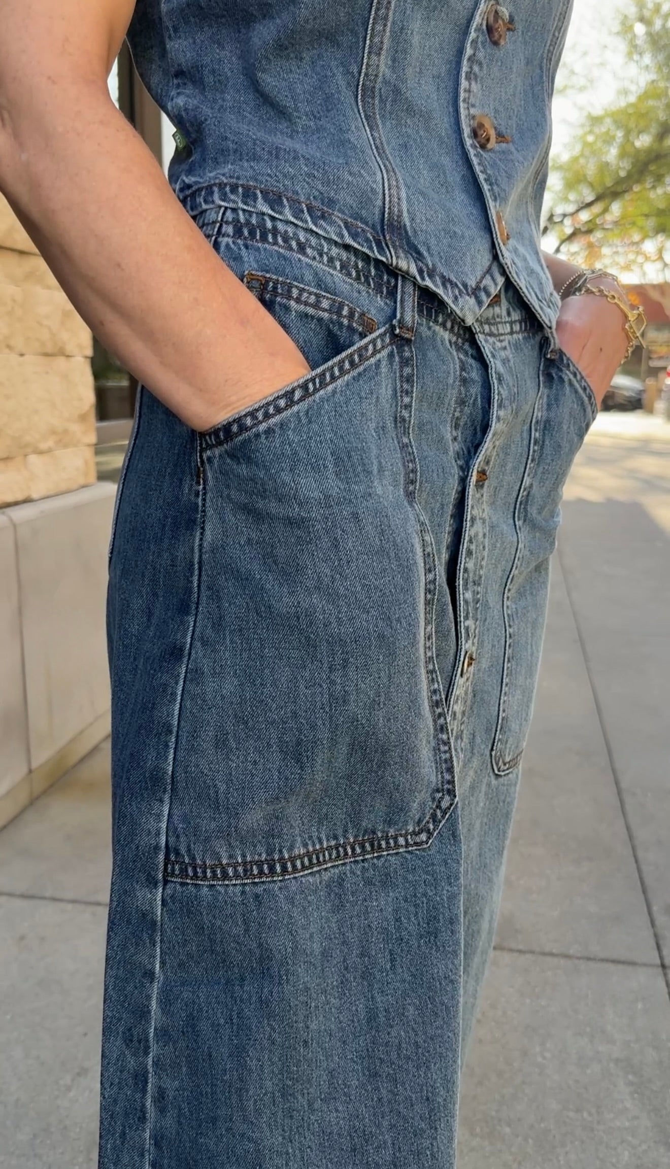 close up on jean skirt pockets