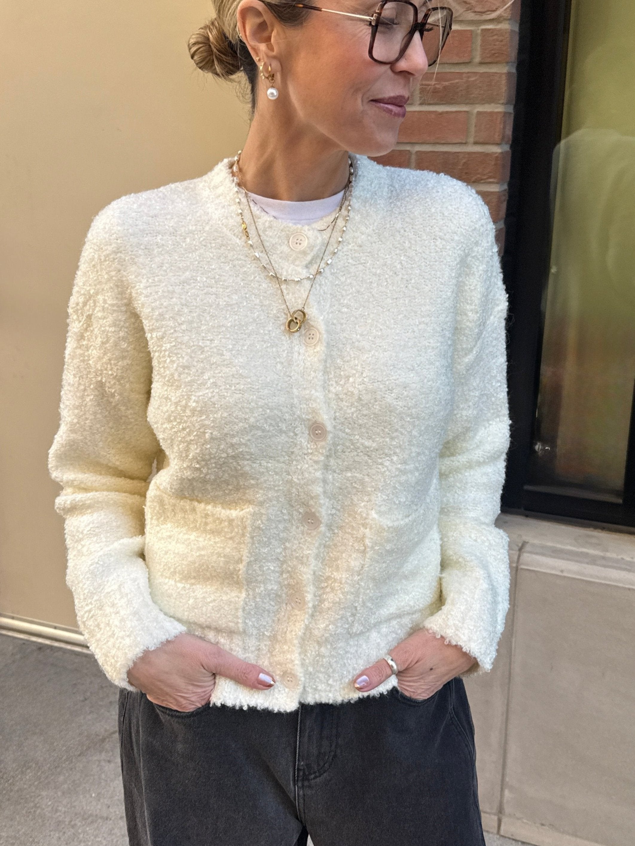 cozy fuzzy white front button cardigan with pockets 