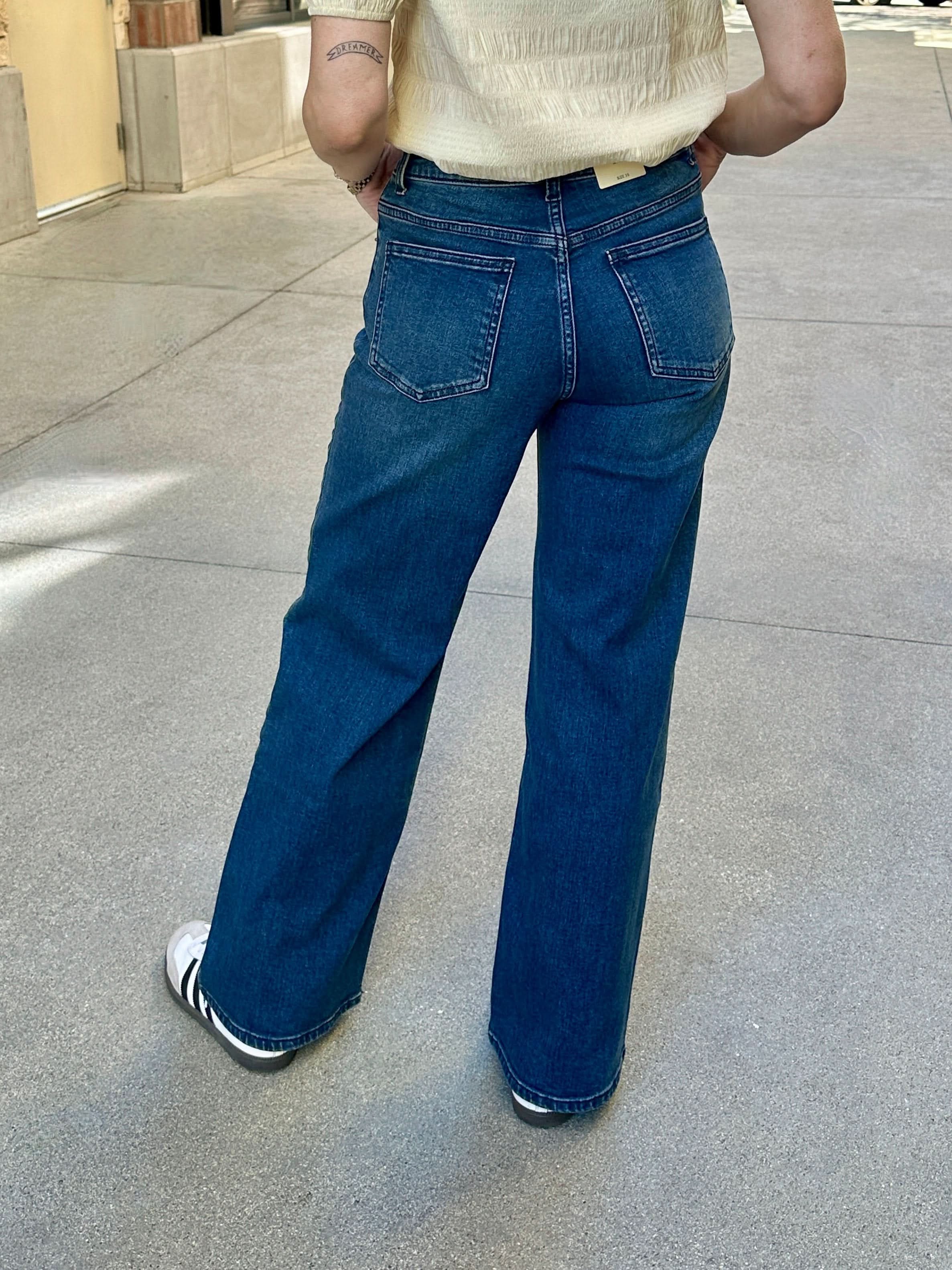 woman wearing Wide Leg, Dark Wash timeless comfort and are perfect for any occasion