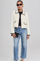 white moon river cropped blazer with black trim and gold buttons