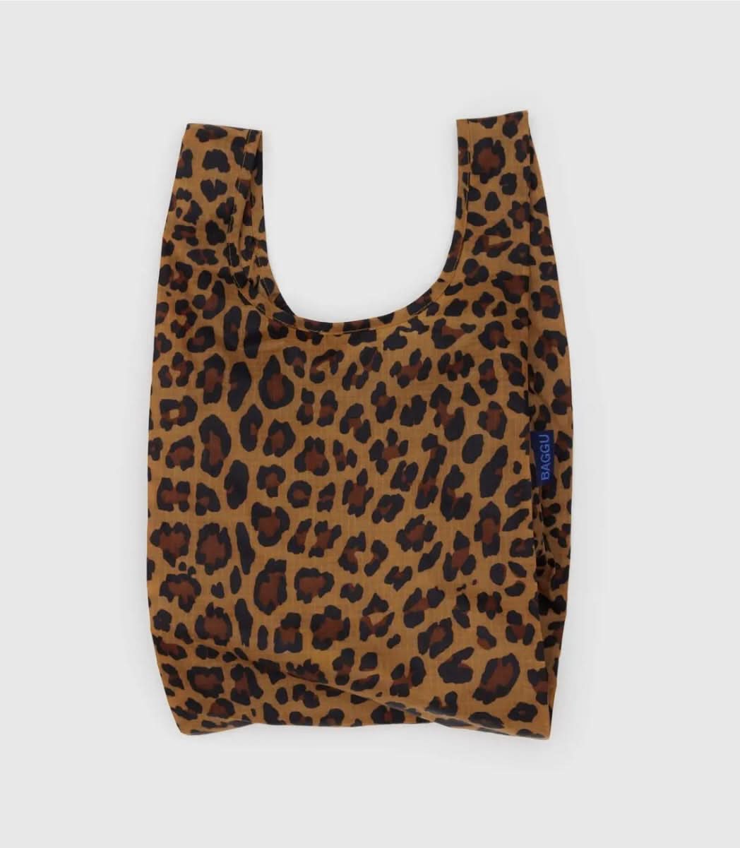 Leopard print BAGGU reusable tote, grocery bag laying flat on a white background