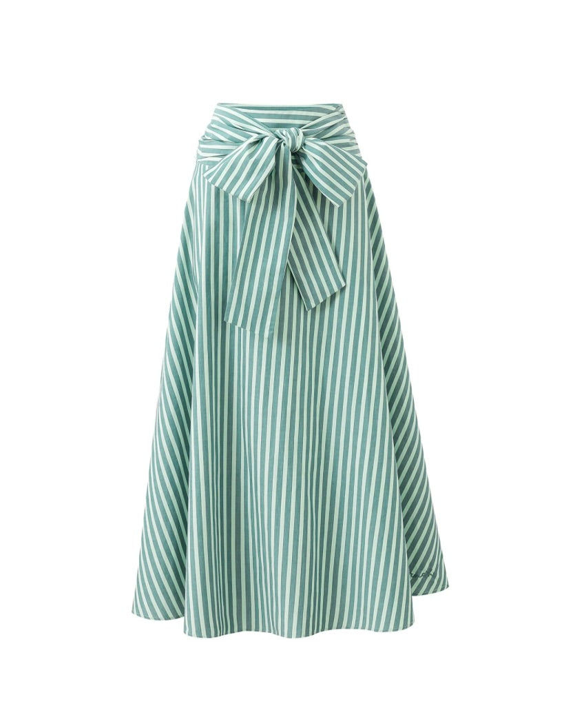 Green and white striped skirt with a tie waist on a white background