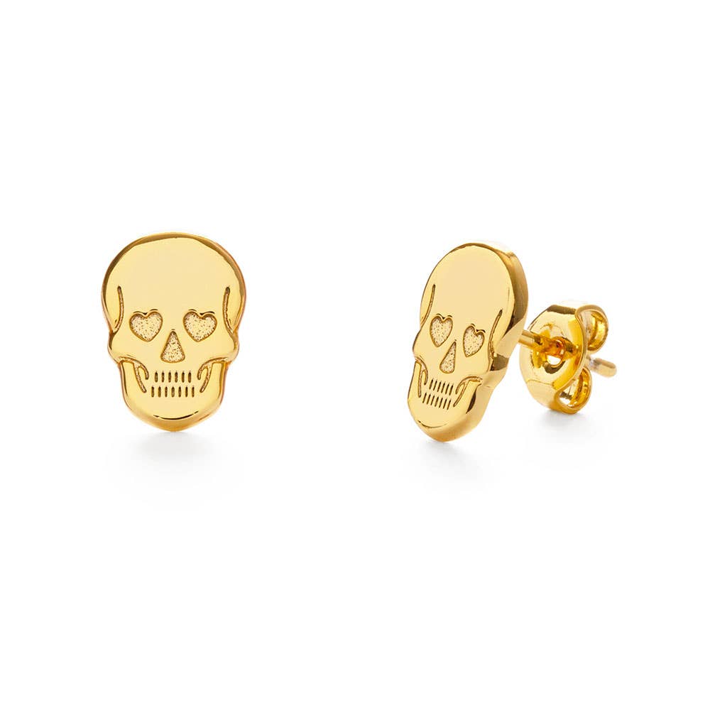 Skull w/Heart-Eyes Stud Earrings Gold skull-shaped earrings on a white background