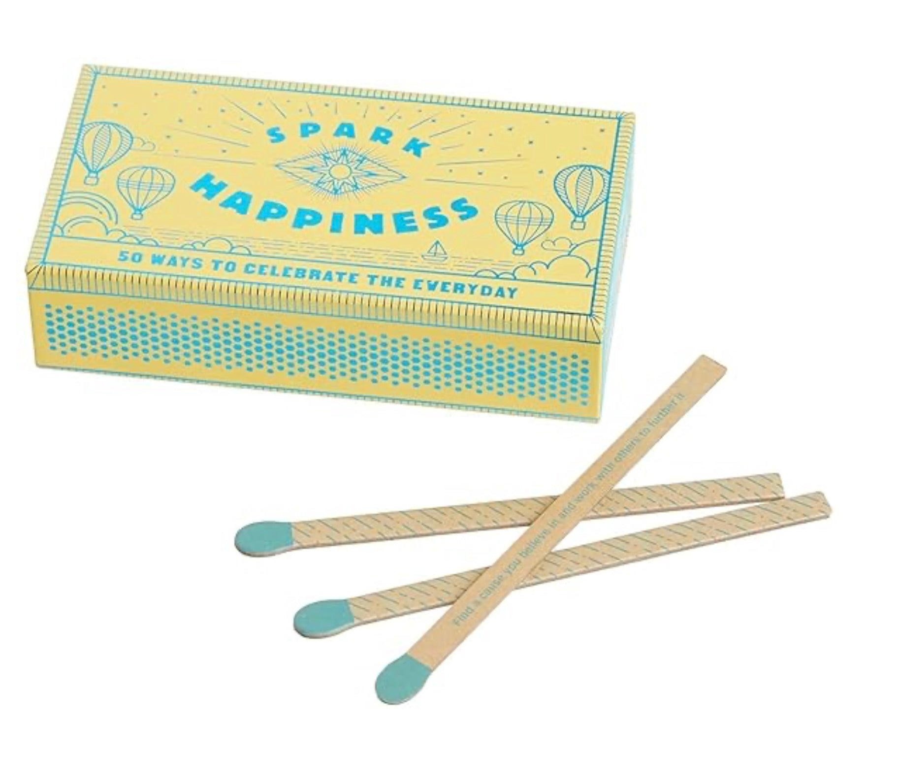Spark Happiness box with illustrated matchstick-style strike pattern.