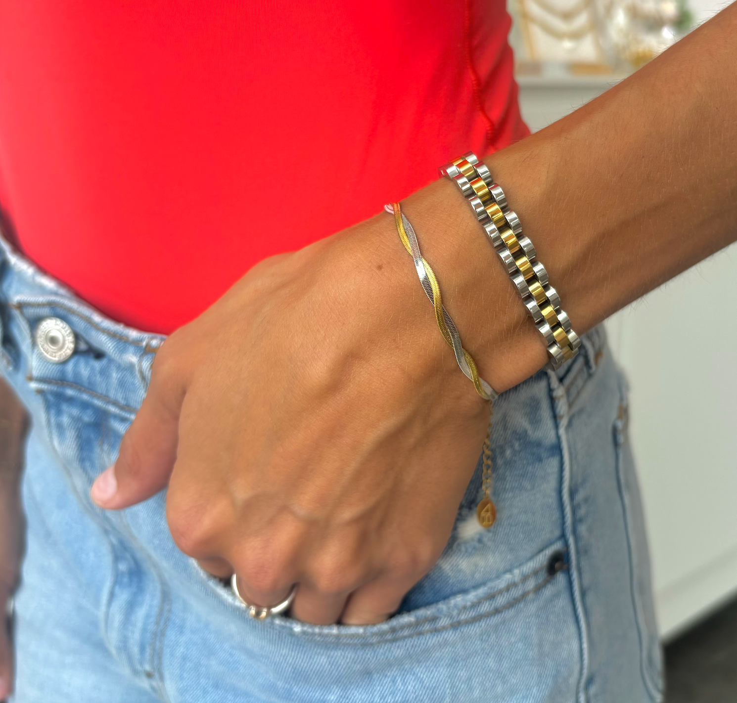 Woman wearing Waterproof silver and gold Cuban Link  bracelet 6" plus a 2" extender