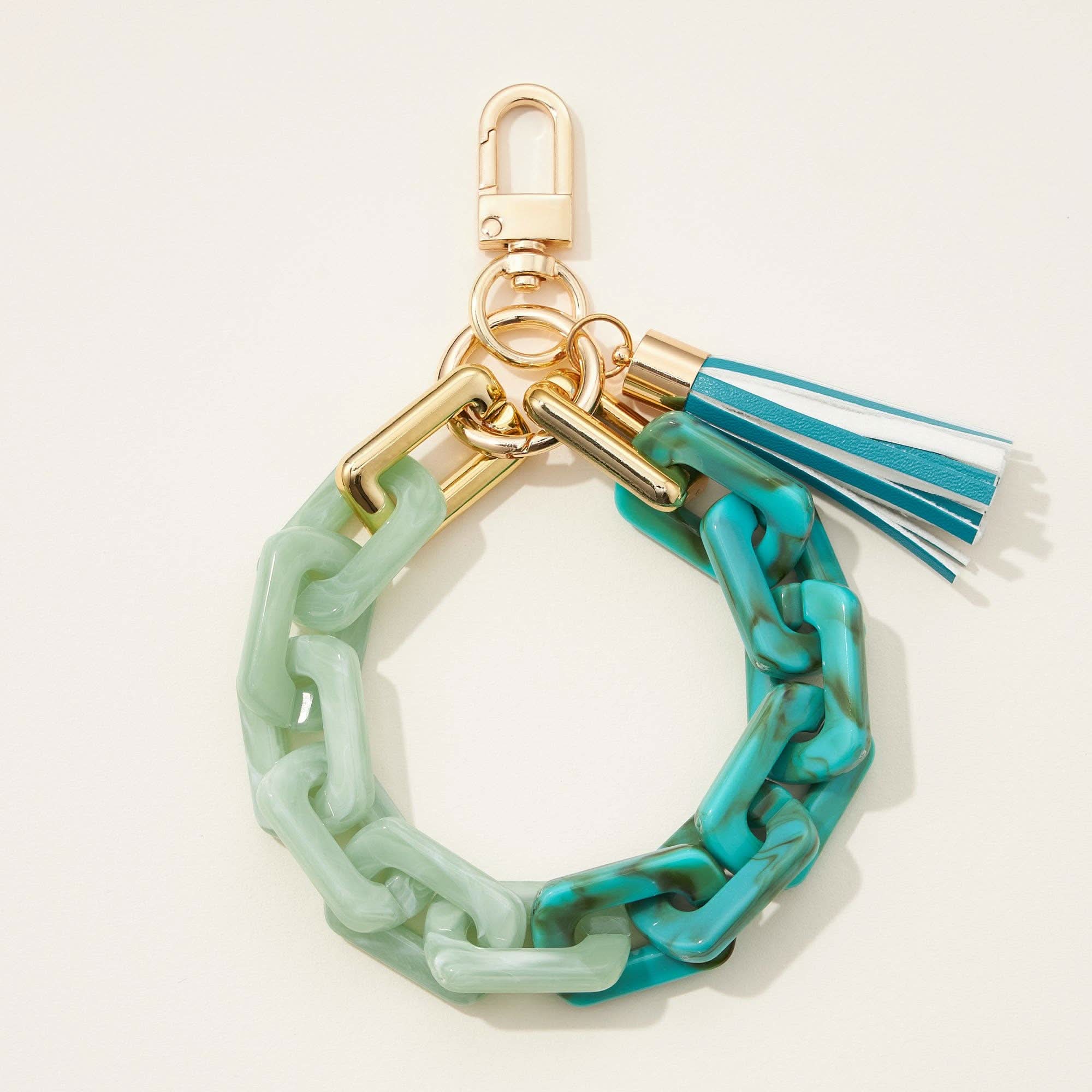 Two toned green, turquoise thick chain keychain with tassel and gold clip details