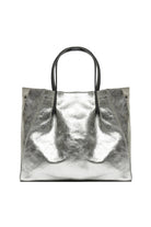 silver metallic leather handbag with black strap and silver buttons