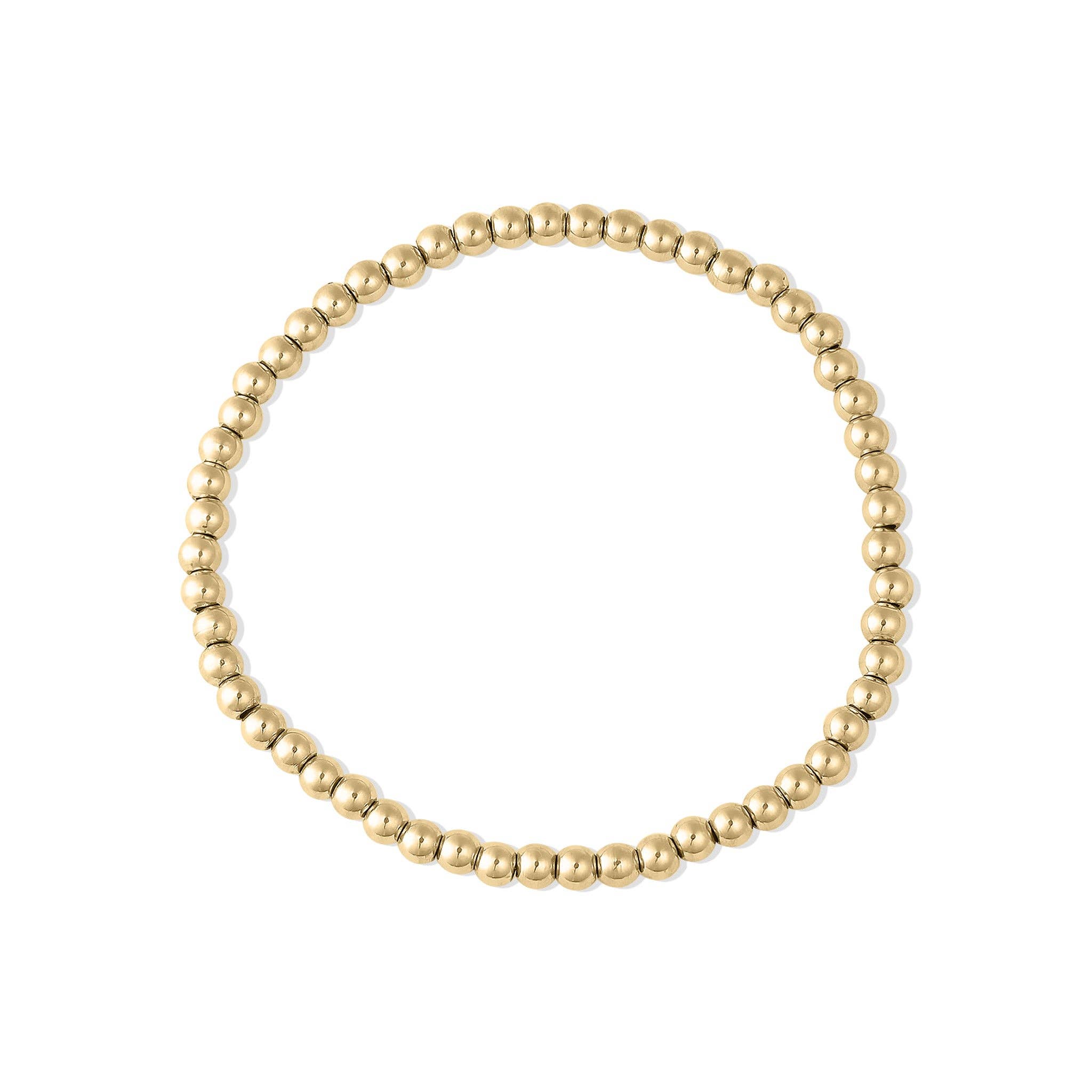 Gold beaded bracelet on a black background