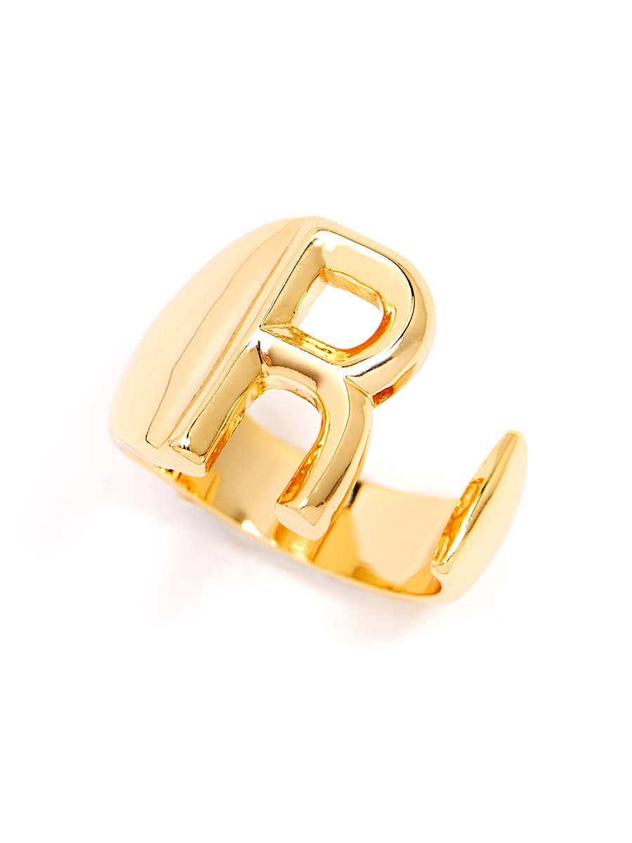 Gold adjustable letter ring on white background in letter R