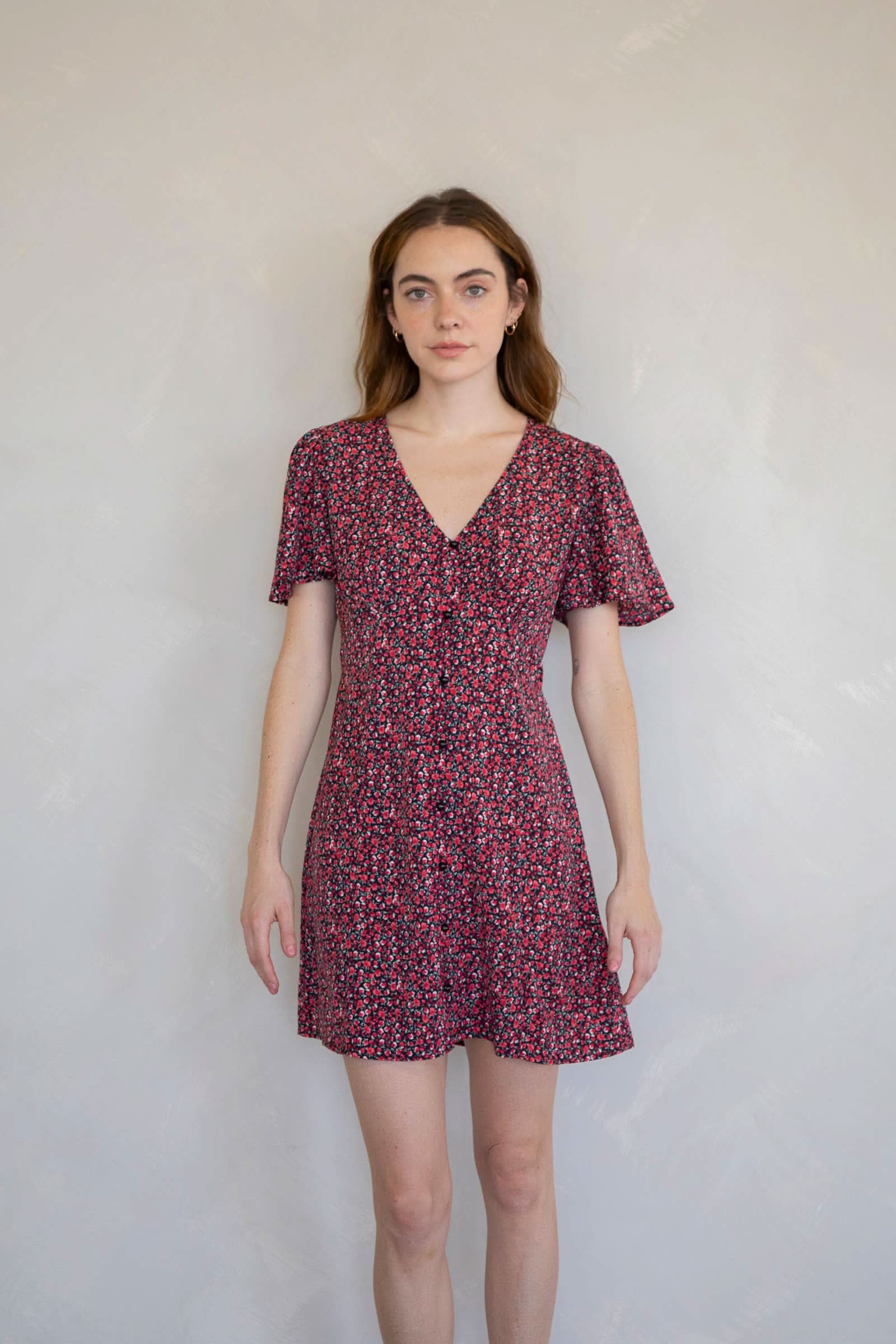 Ara Mini Dress Woman wearing a patterned dress 