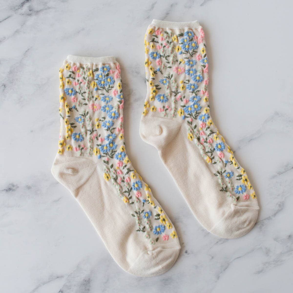 romantic floral socks with white, blue yellow, and pink