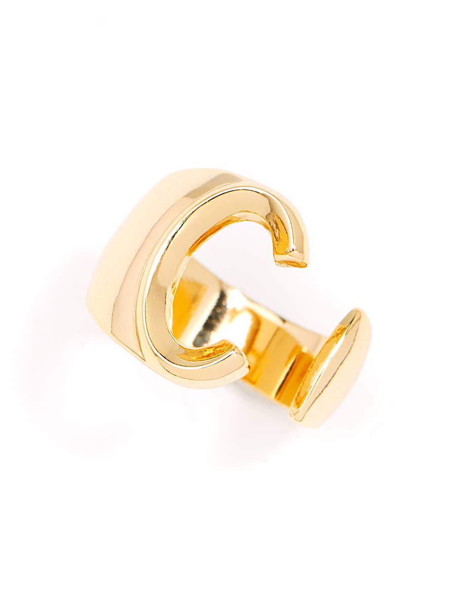 Gold adjustable letter ring on white background in letter C