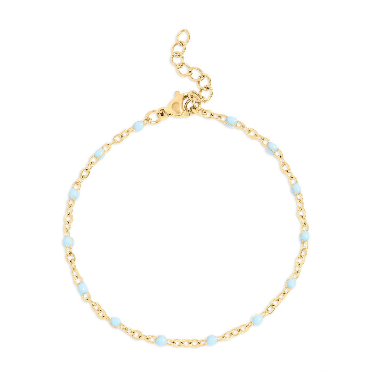 Gold bracelet with small blue beads on a white background