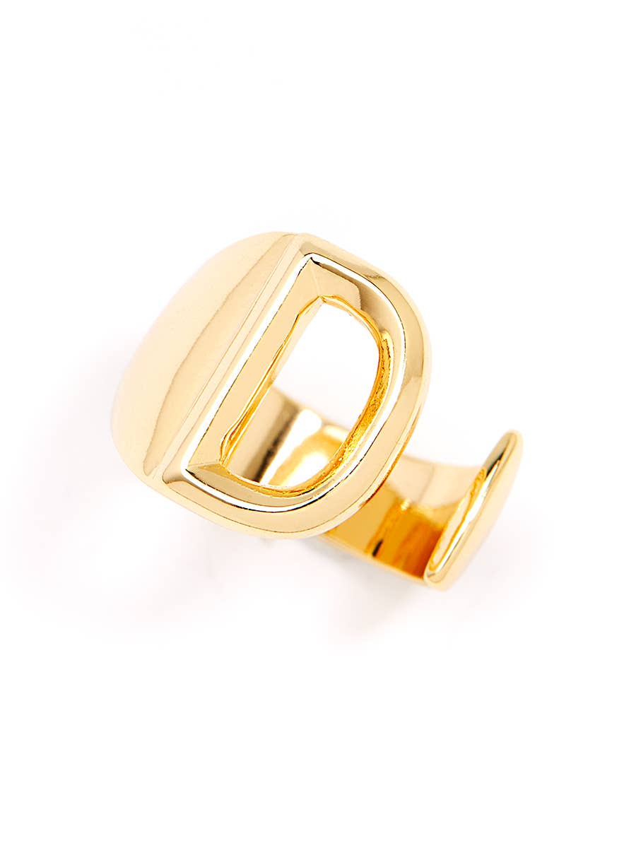 Gold adjustable letter ring on white background in letter D