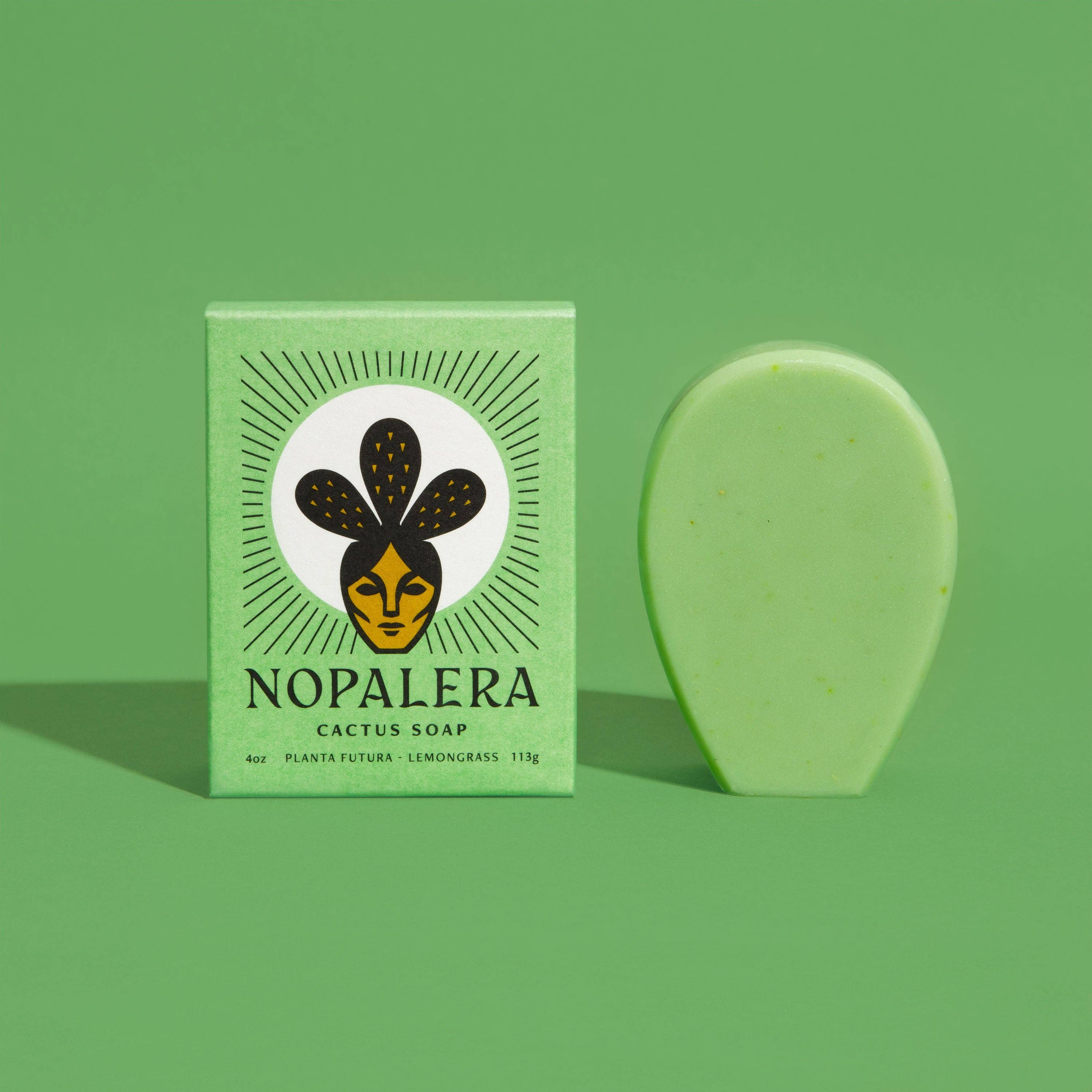 Nopalera cactus soap bar and packaging on a green background