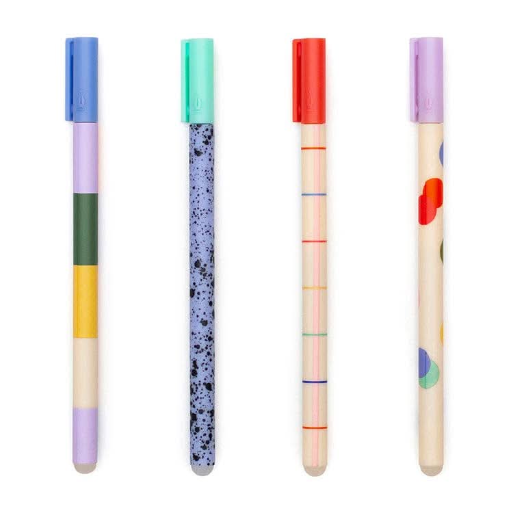 Four pens side by side with colorful prints 