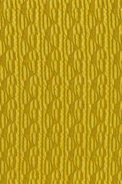 Close up on the material of a chartreuse, square neck line, textured, long sleeve top