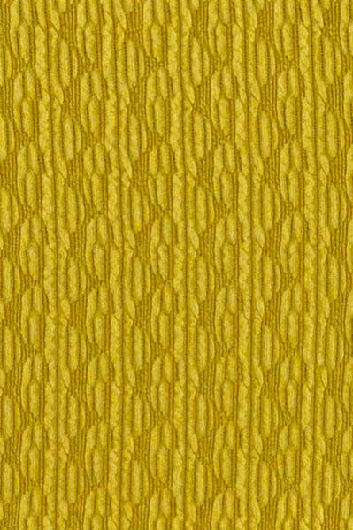 Close up on the material of a chartreuse, square neck line, textured, long sleeve top