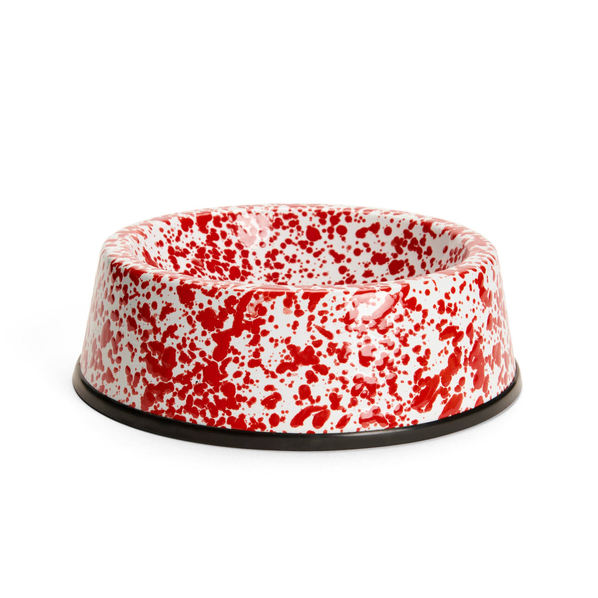 Red and white speckled pet bowl on a white background