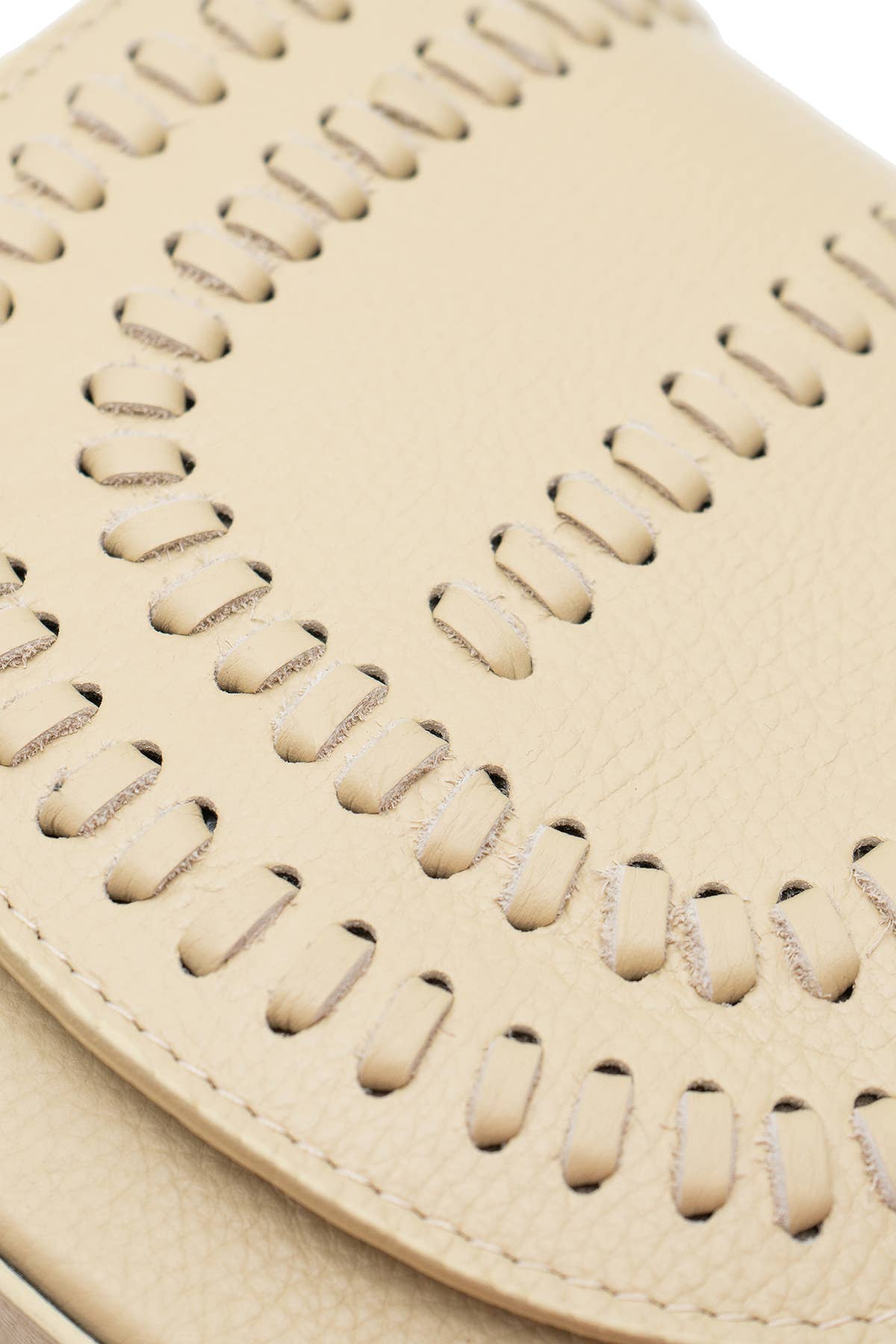 Cream colored leather crossbody bag with magnetic front clap and leather woven geometric design and gold Metal details 