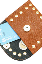 Chestnut brown flap wallet with gold embellishes outlining the wallet. Wallet is holding cards and coins 