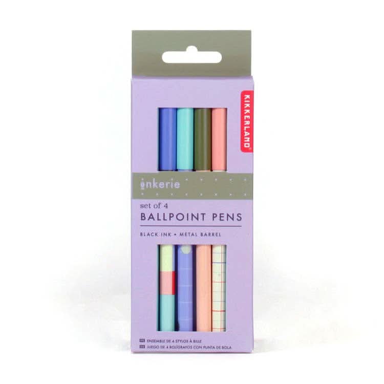 Four colorful ballpoint pens in packaging 