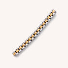 Waterproof silver and gold Cuban Link 6" plus a 2" extender laying on white background 