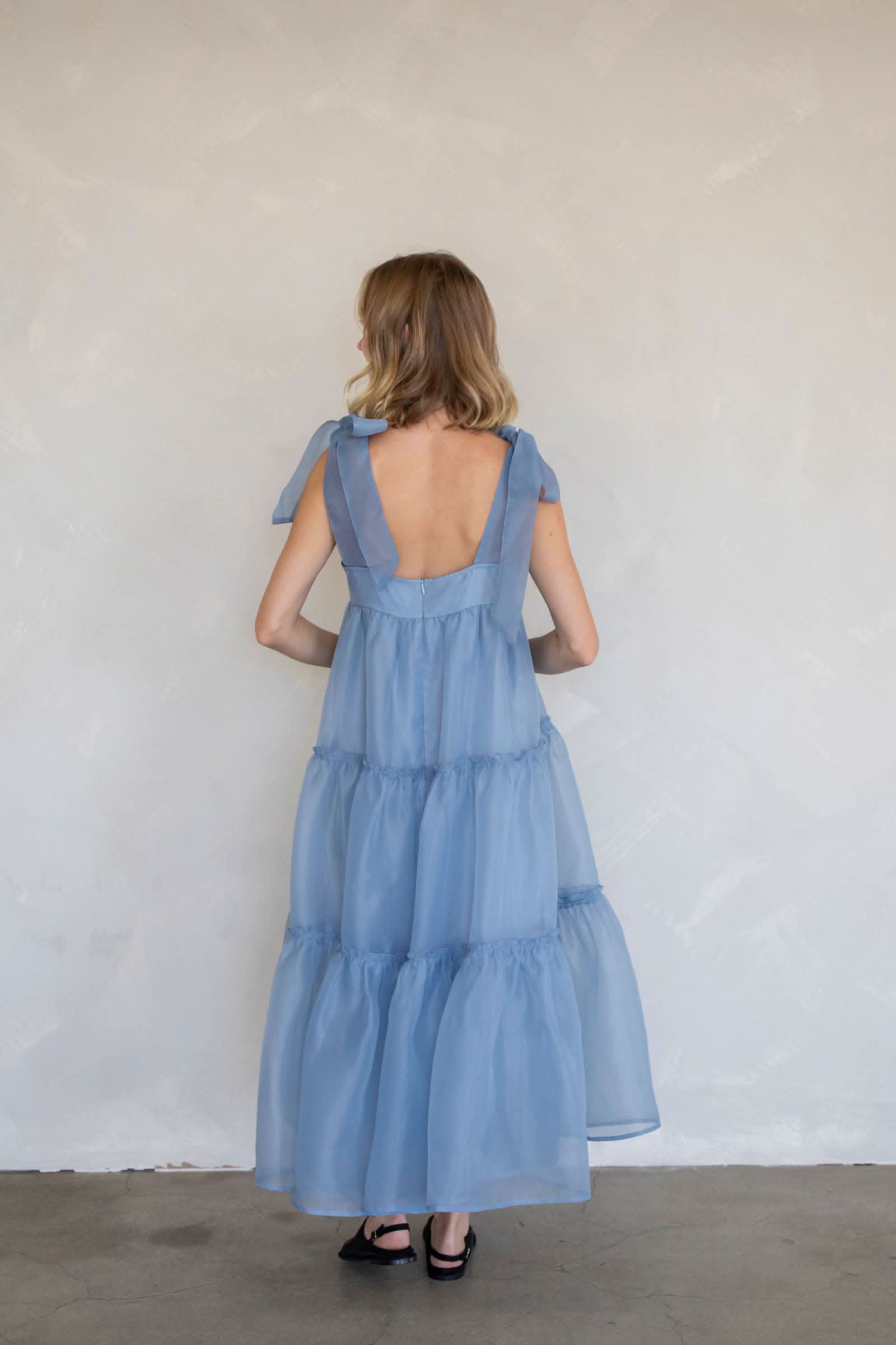 Ella Maxi Bow Strap Dress Woman wearing a blue dress 