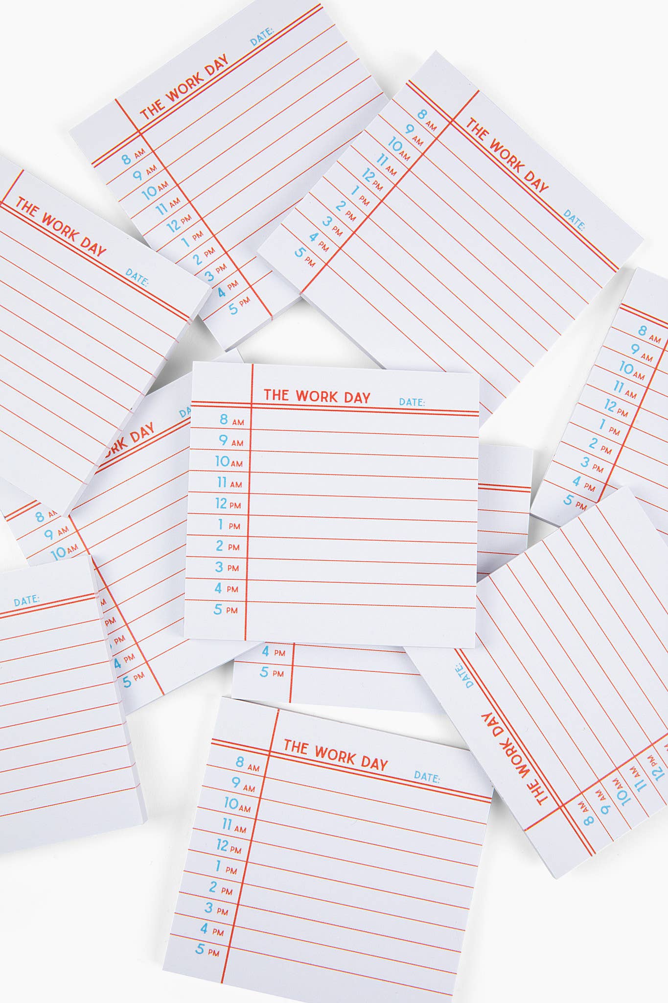 Multiple sheets of lined paper with 'The Work Day' text on a white background