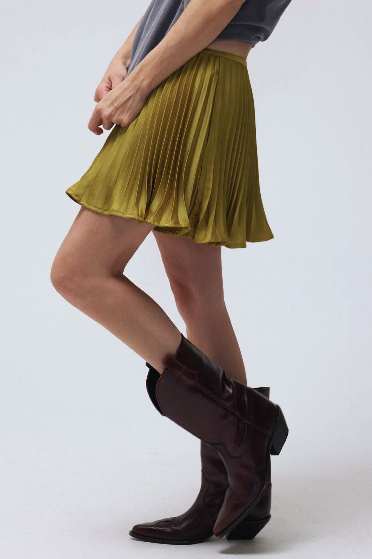 Pleated Satin Mini Skort look of a mini skirt with the comfort of built-in shorts,