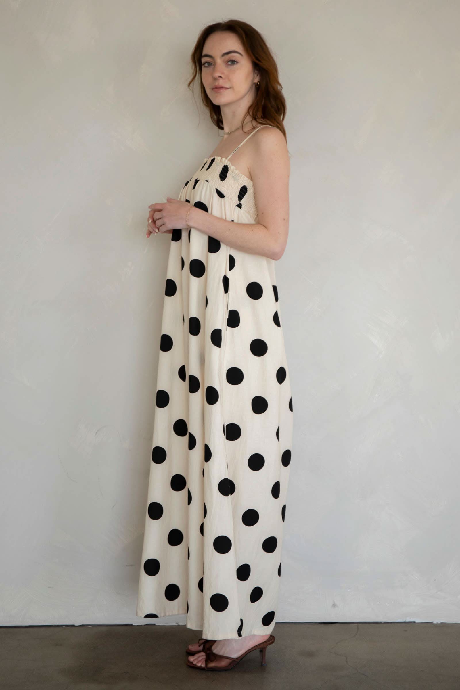 Cream Sandy Polka Dot Maxi Dress Woman wearing a long polka dot dress 