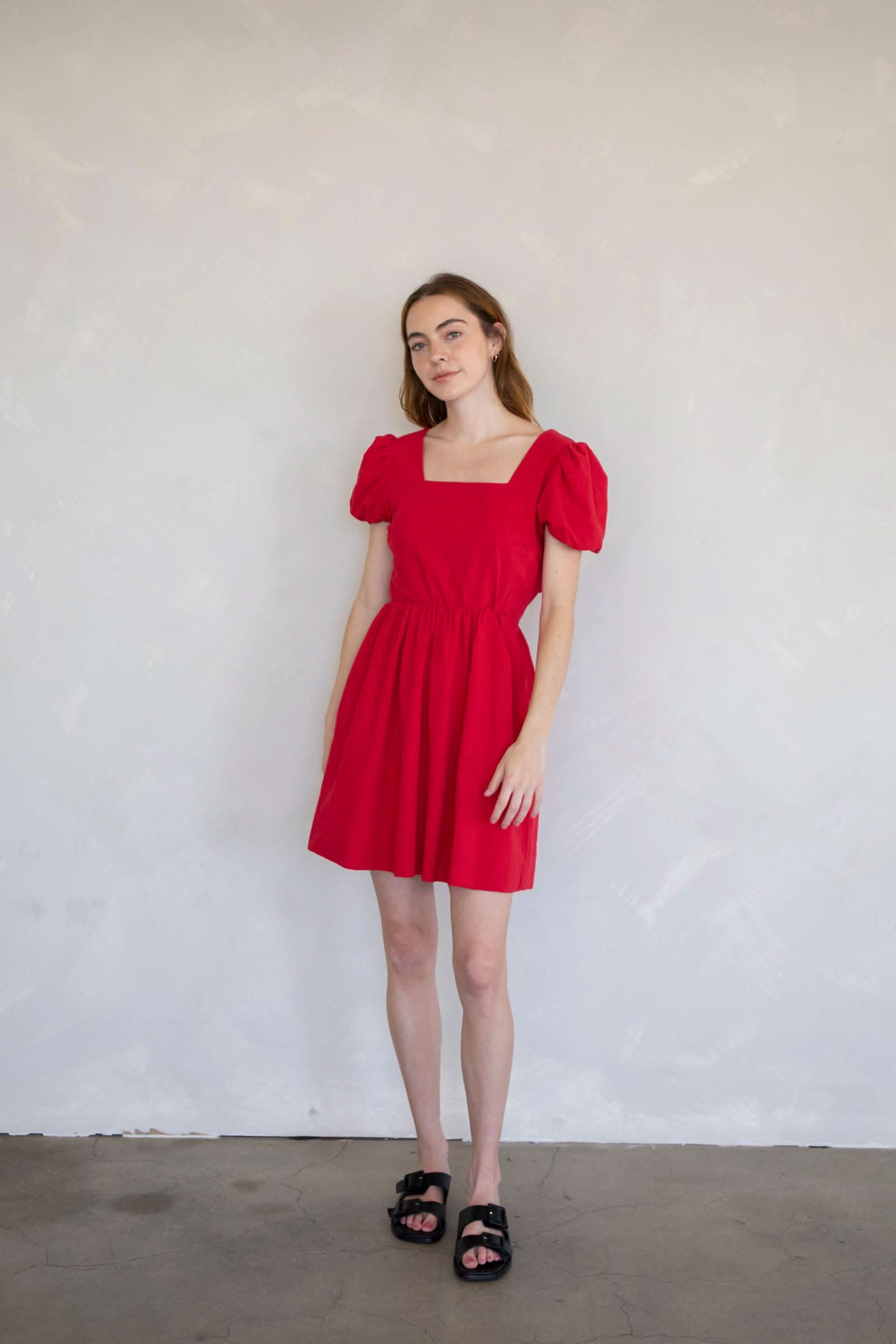 Violet Mini Dress Woman wearing a red dress Form and content